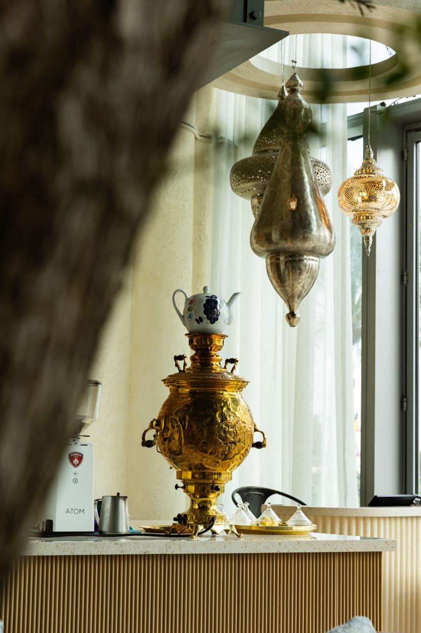 Decorative lanterns and a traditional coffee service inside SOYL